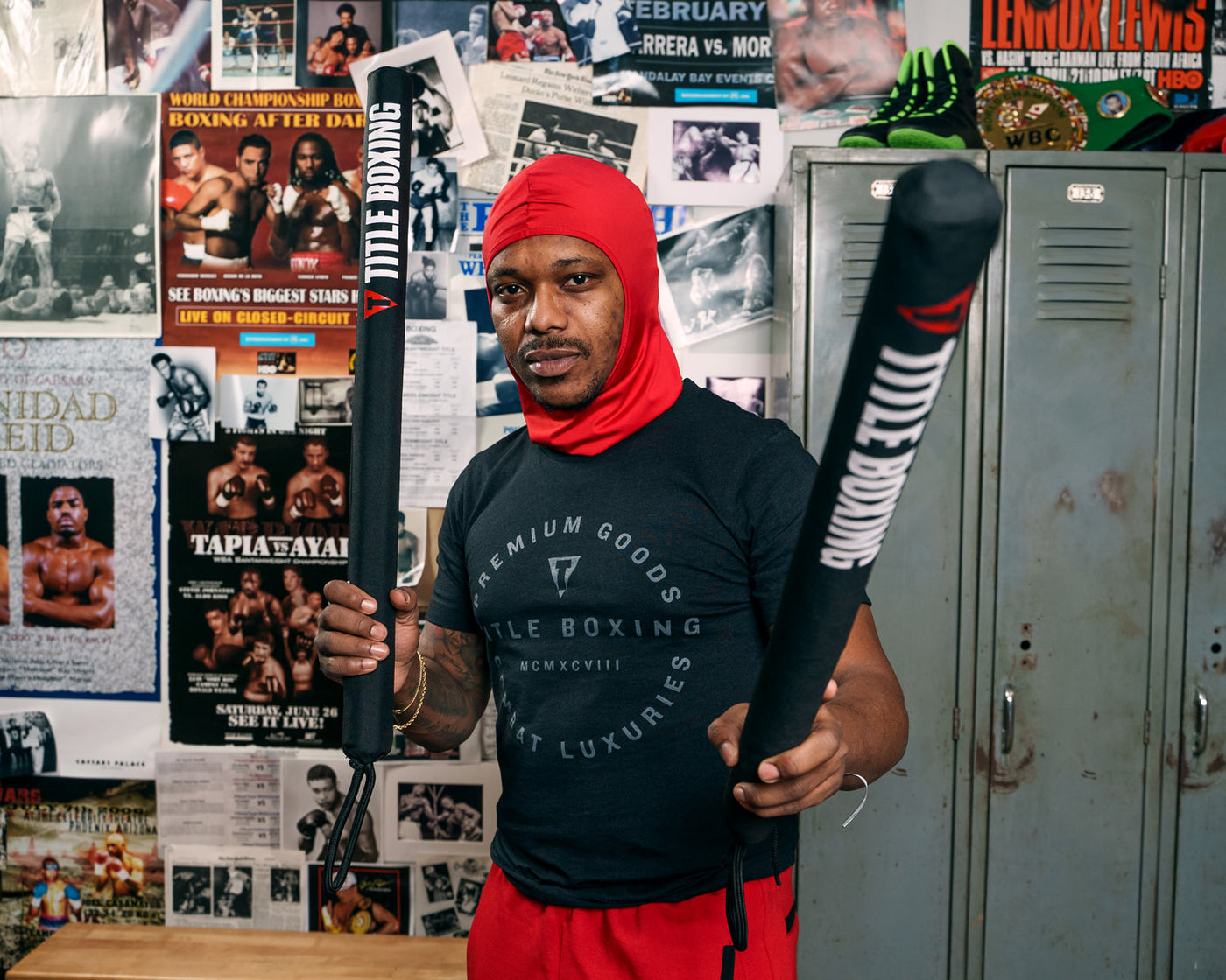 variant:lifestyle::TITLE Boxing Precision Training Sticks 2.0 coach sticks up