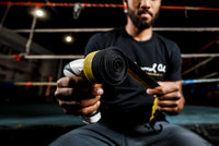variant:lifestyle::TITLE Boxing Wrap Wrench being used by boxer outside of the ring