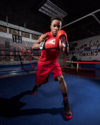 variant:Red/White::TITLE Premier Leather Super Bag Gloves 2.0 boy posing in ring